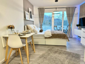Modernes Apartment inkl. TG-Stellplatz in der Nähe zum Bahnhof - YUKA Apartments
